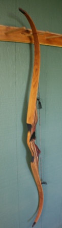 Zebra/cocobolo riser with yew limbs Bacote/cocobolo riser with yew limbs